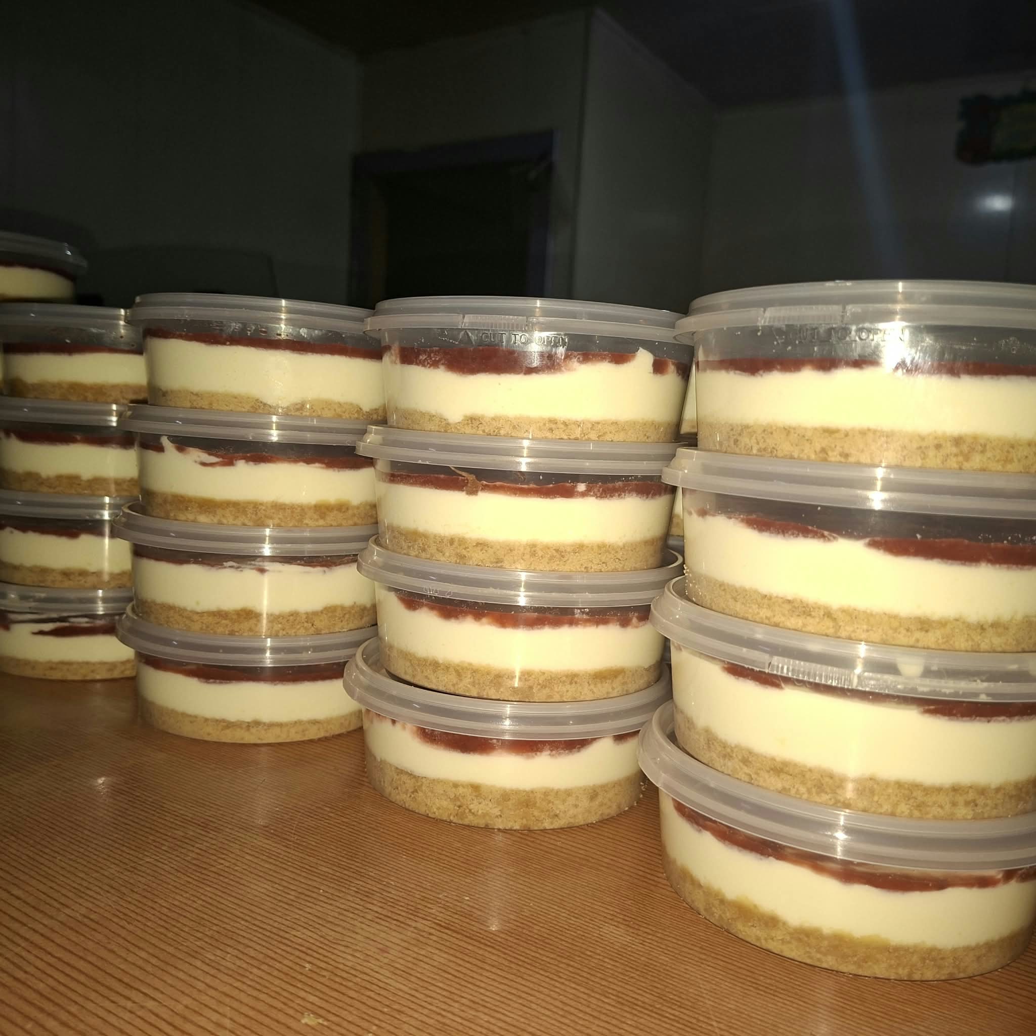 A batch of Kate's homemade cheesecake cups ready for customers